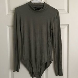 Newagerebel One Piece turtle neck. New!